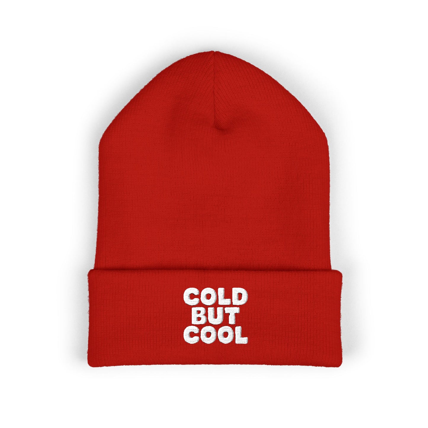 Red beanie with 'Cold But Cool' embroidery text on a white background