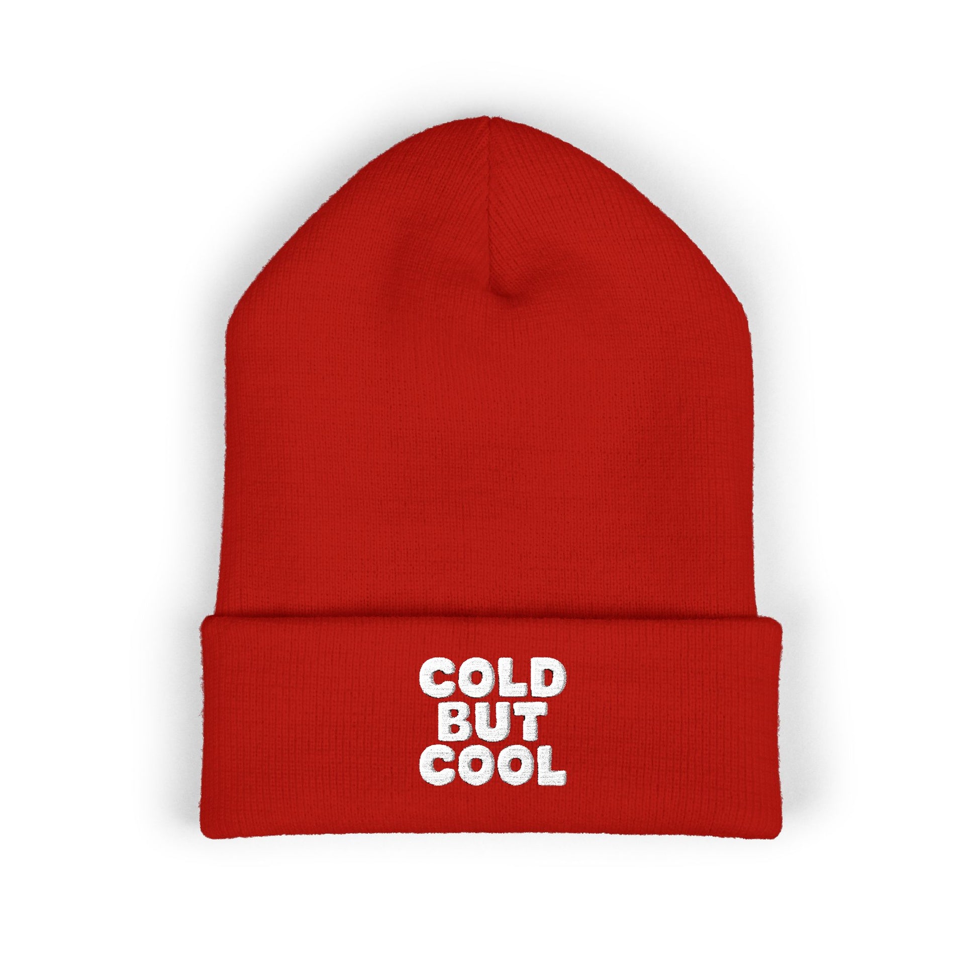 Red beanie with 'Cold But Cool' embroidery text on a white background