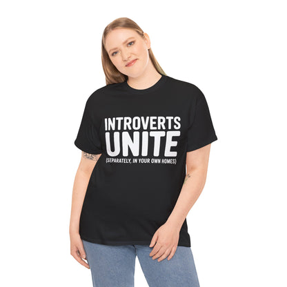 Person wearing a black t-shirt with 'INTROVERTS UNITE (SEPARATELY, IN YOUR OWN HOMES)' text on a white background | TEEZOCA