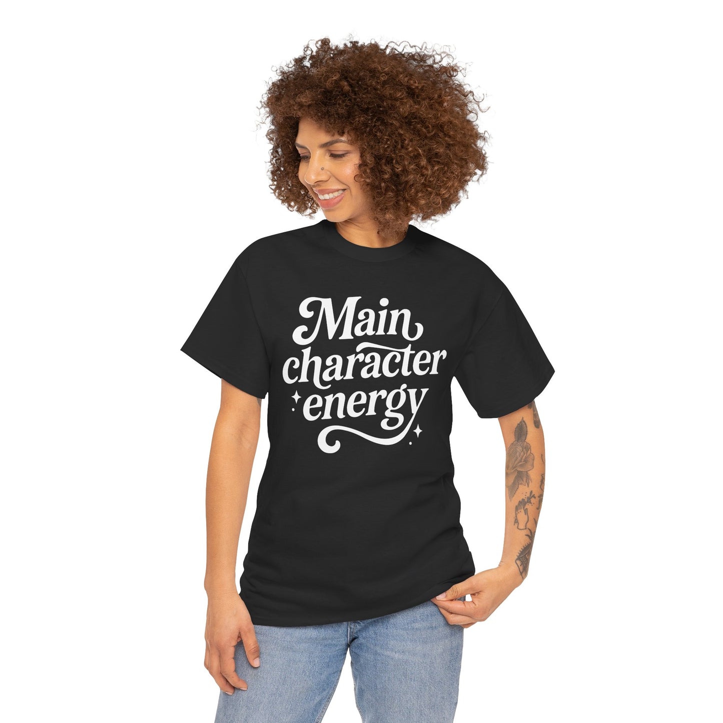 “Female model wearing Teezoca Main Character Energy t-shirt, flowing white script confidence design, black unisex tee, front.”

