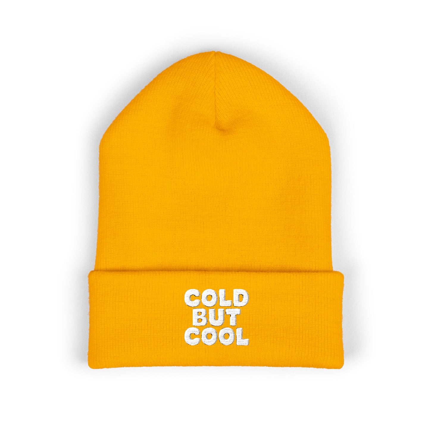 Yellow beanie with 'Cold But Cool' text on a white background