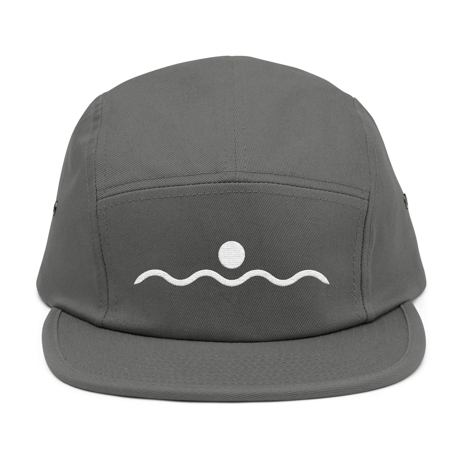 Gray cap with a white wave and sun design on a white background. Minimal sunset and wave line-art graphic in white. TEEZOCA
