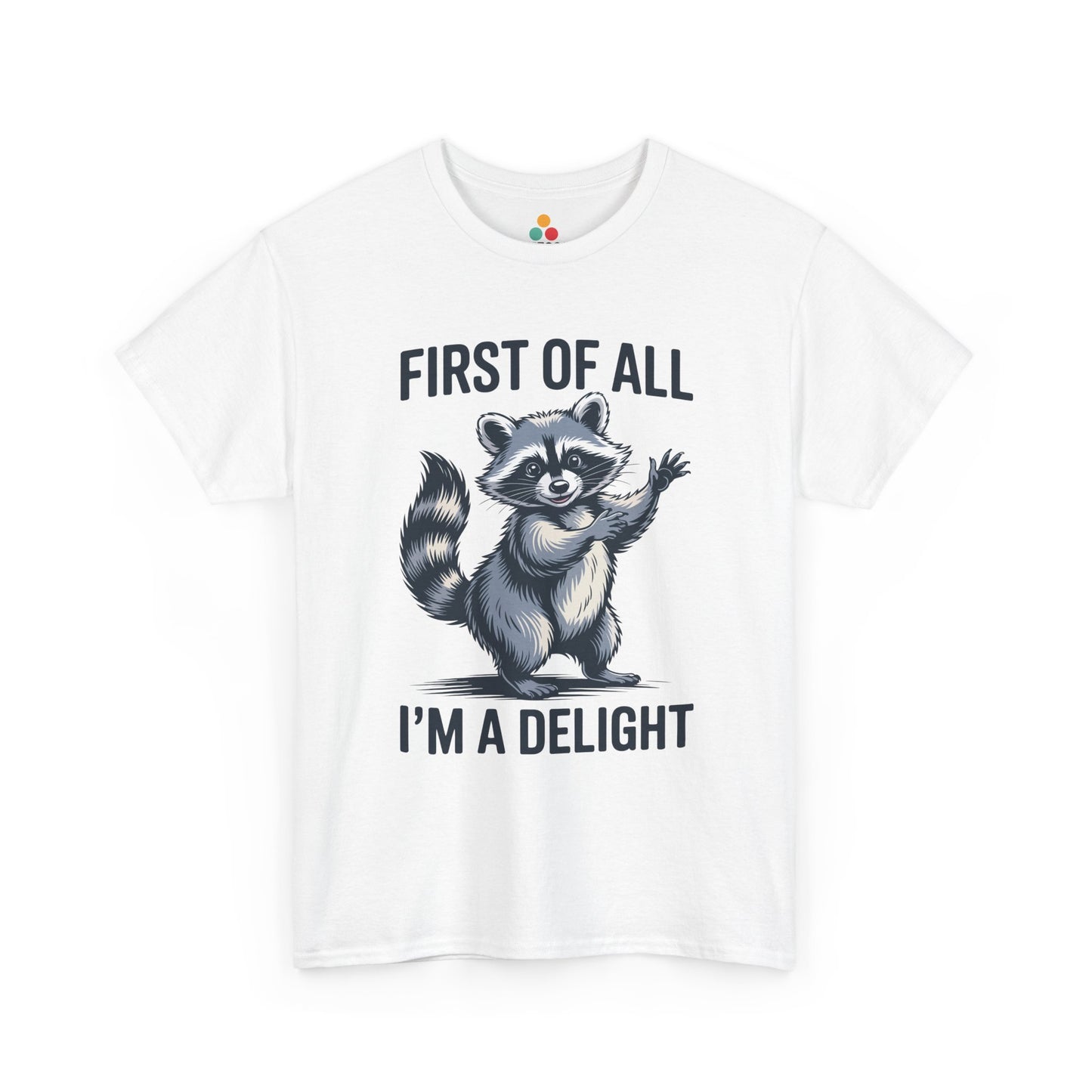 TEEZOCA white “First Of All I’m A Delight” waving raccoon t‑shirt shown flat.