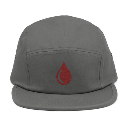 Gray cap with a red droplet symbol on a white background. Minimal coffee drop icon embroidered in a clean, modern style 5-panel cap. TEEZOCA