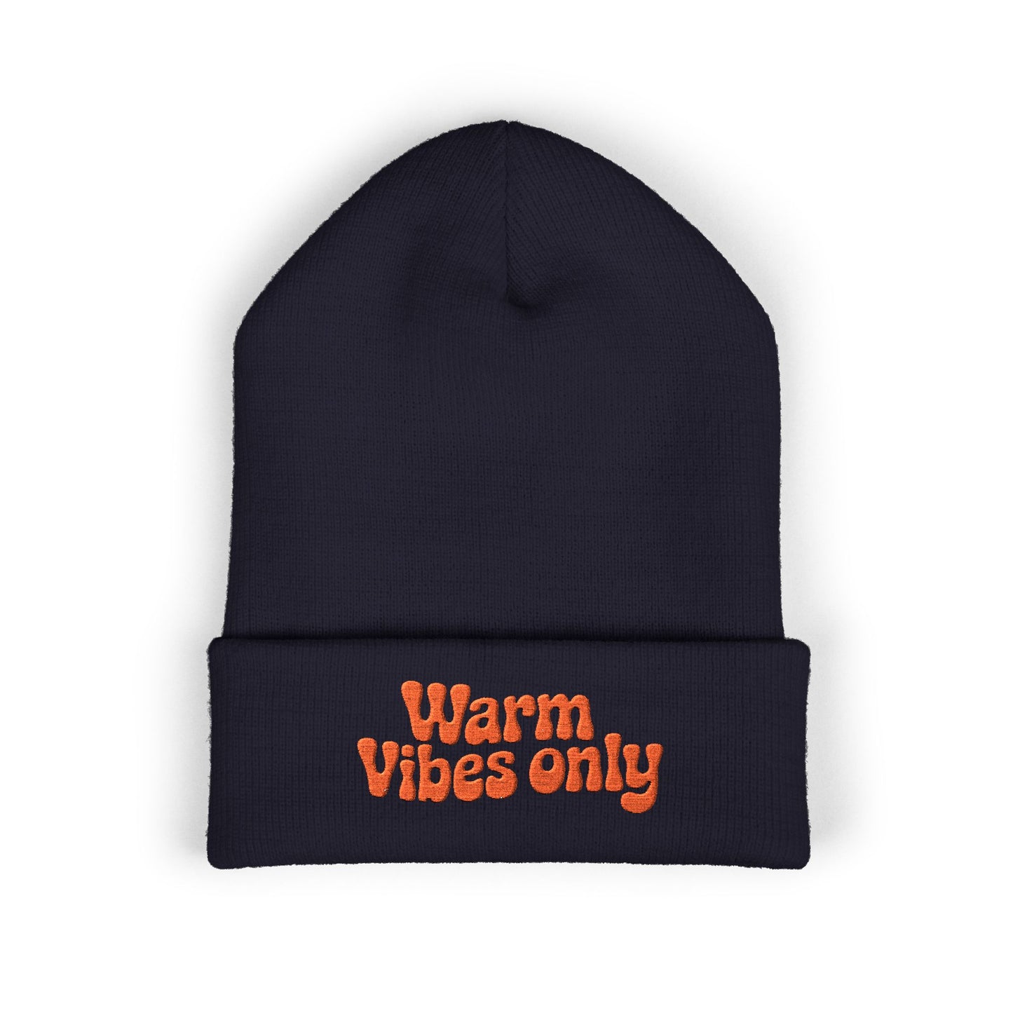 Black beanie with 'Warm Vibes only' text in orange on a white background. “Warm vibes only” embroidered patch on cozy cuffed beanie in retro orange thread.