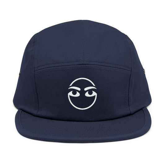 Navy blue cap with a white logo on a white background. Raised brow face minimalist embroidery design in white. TEEZOCA