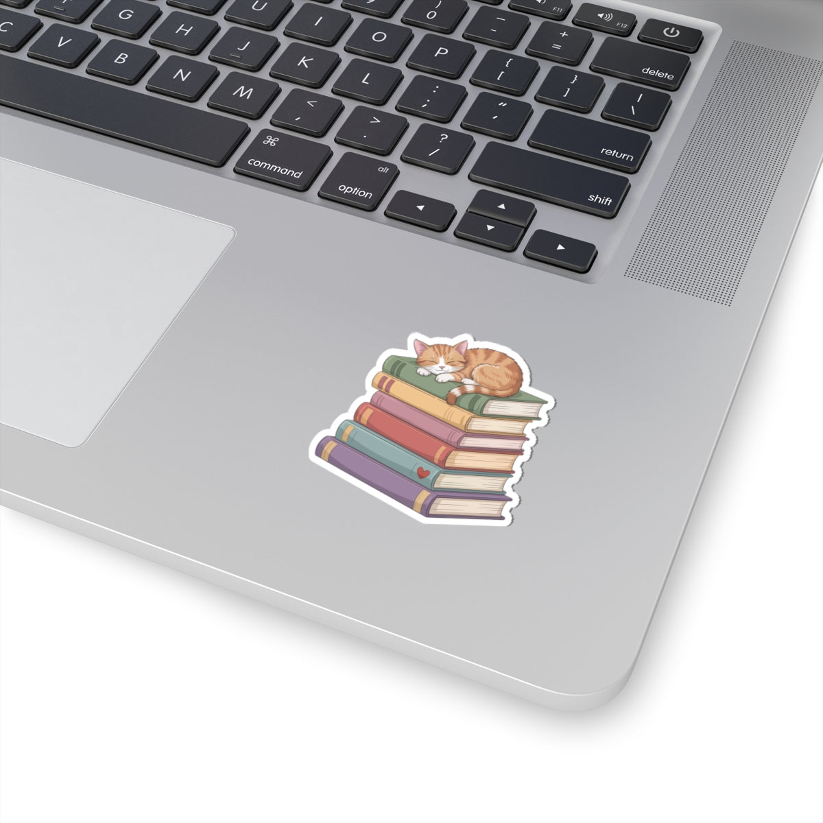 TEEZOCA book lover sticker cat sleeping on stacked books design