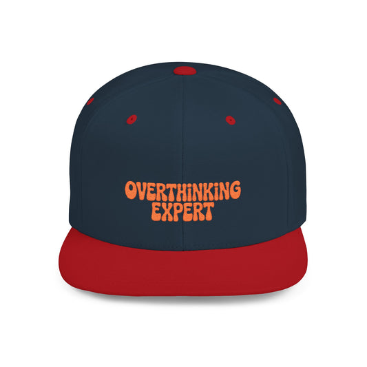 Navy and red cap with 'Overthinking Expert' text on a white background