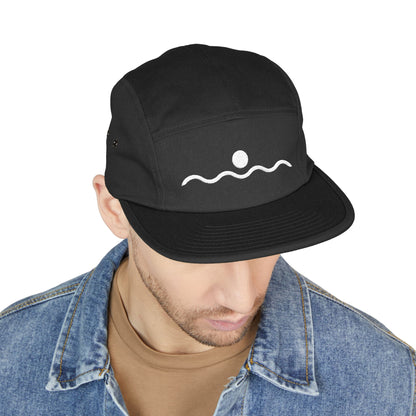 Black cap with a white logo worn by a person on a white background. Simple sun above wavy line illustration minimalist design embroidery. TEEZOCA