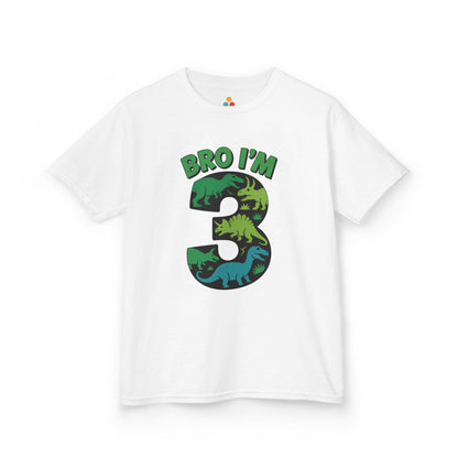 "White kids t‑shirt with large green, blue, and orange dinosaur-filled number 3 and the text 'BRO I'M 3,' flat front view."

