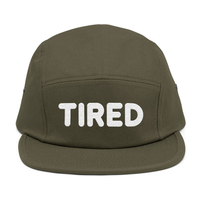 Green cap with 'TIRED' text on a white background. TIRED minimalist text embroidered on 5-panel cap by TEEZOCA