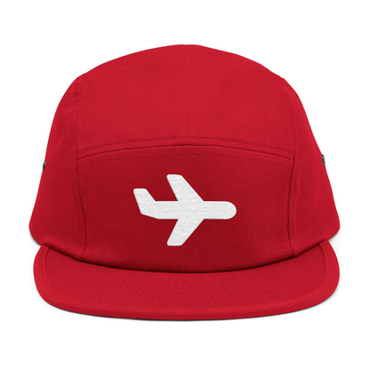 Red cap with a white airplane emblem on a white background. Minimal white airplane icon embroidered on black 5-panel cap. TEEZOCA
