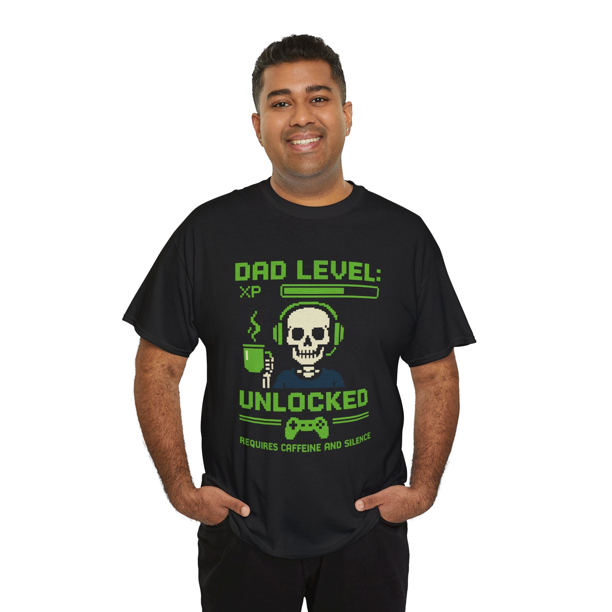 “Man wearing black pixel skull gamer dad shirt with green controller graphic and XP bar, smiling front view.”

