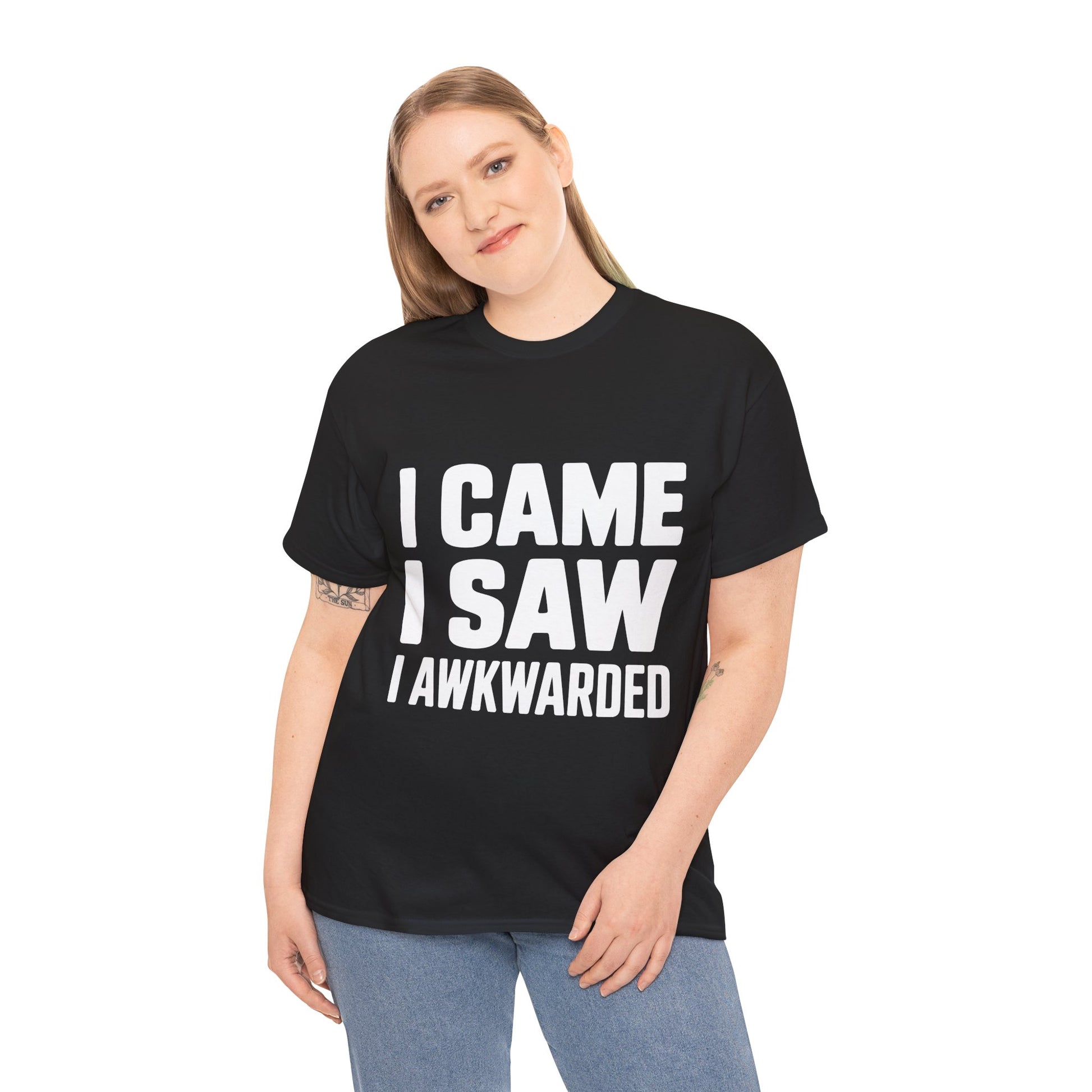 Person wearing a black t-shirt with humorous text 'I CAME. I SAW. I AWKWARDED' on a white background | TEEZOCA