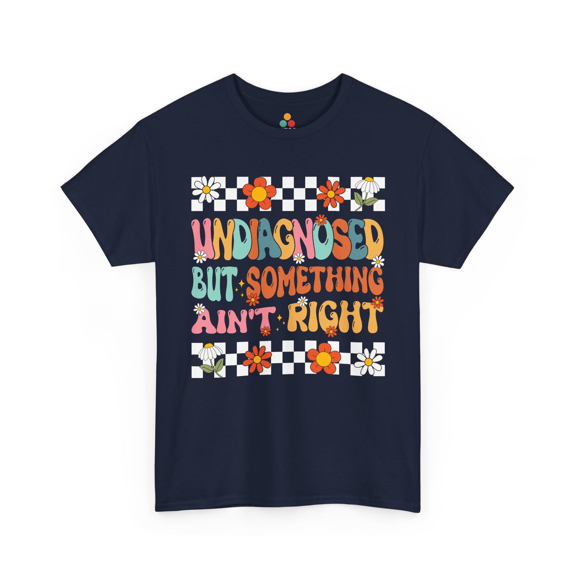Navy blue t-shirt with colorful text and floral patterns on a white background