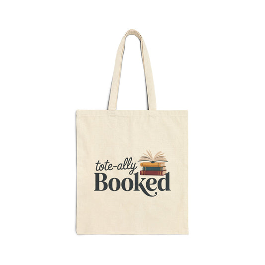 TEEZOCA tote bag with Totally Booked text and stacked books illustration