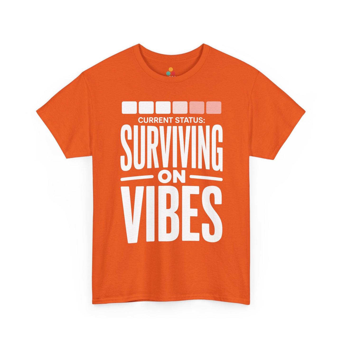 Orange t-shirt with 'Current Status: Surviving on Vibes' text on a white background | TEEZOCA