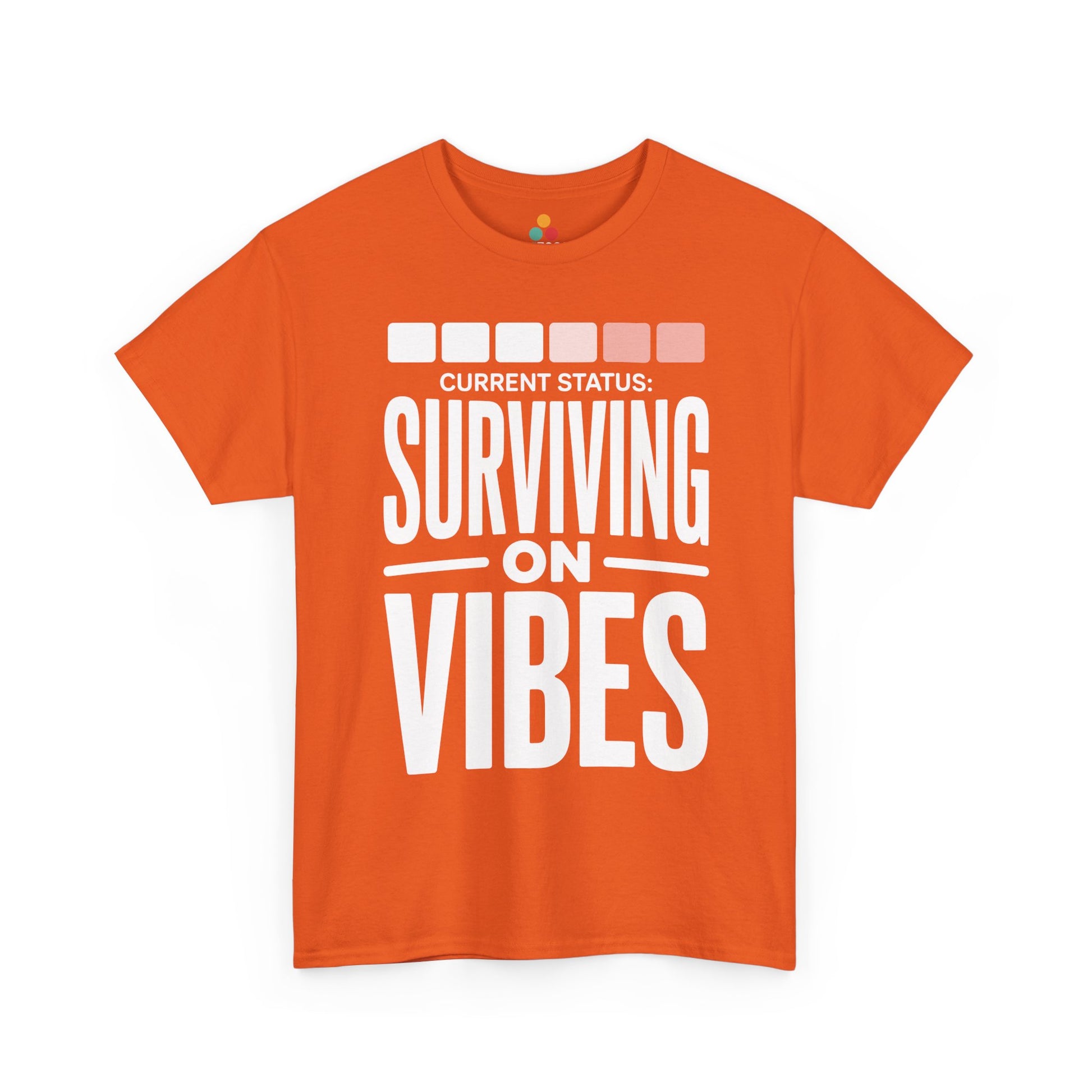 Orange t-shirt with 'Current Status: Surviving on Vibes' text on a white background | TEEZOCA