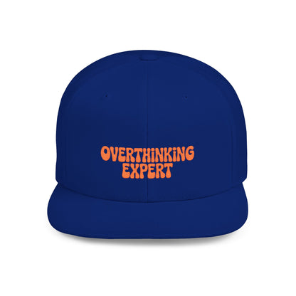 Blue cap with 'Overthinking Expert' text in orange on a white background