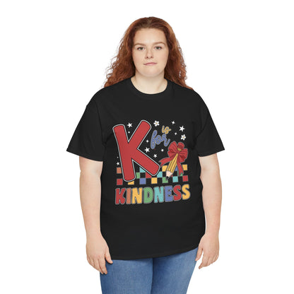 “Female teacher wearing Teezoca K is for Kindness shirt, colorful classroom kindness design, black unisex tee, front.”

