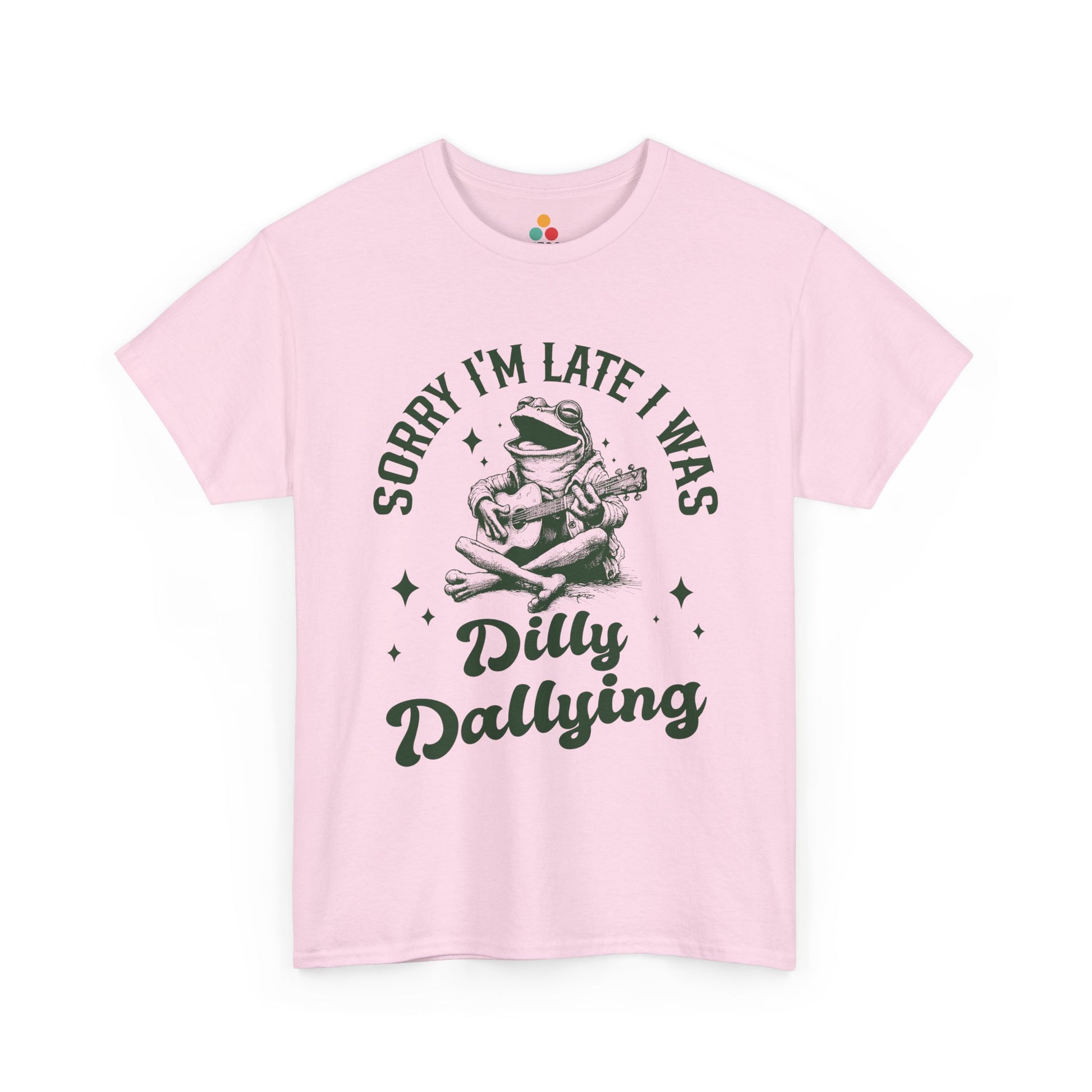 Pink t-shirt with a frog graphic and text on a white background