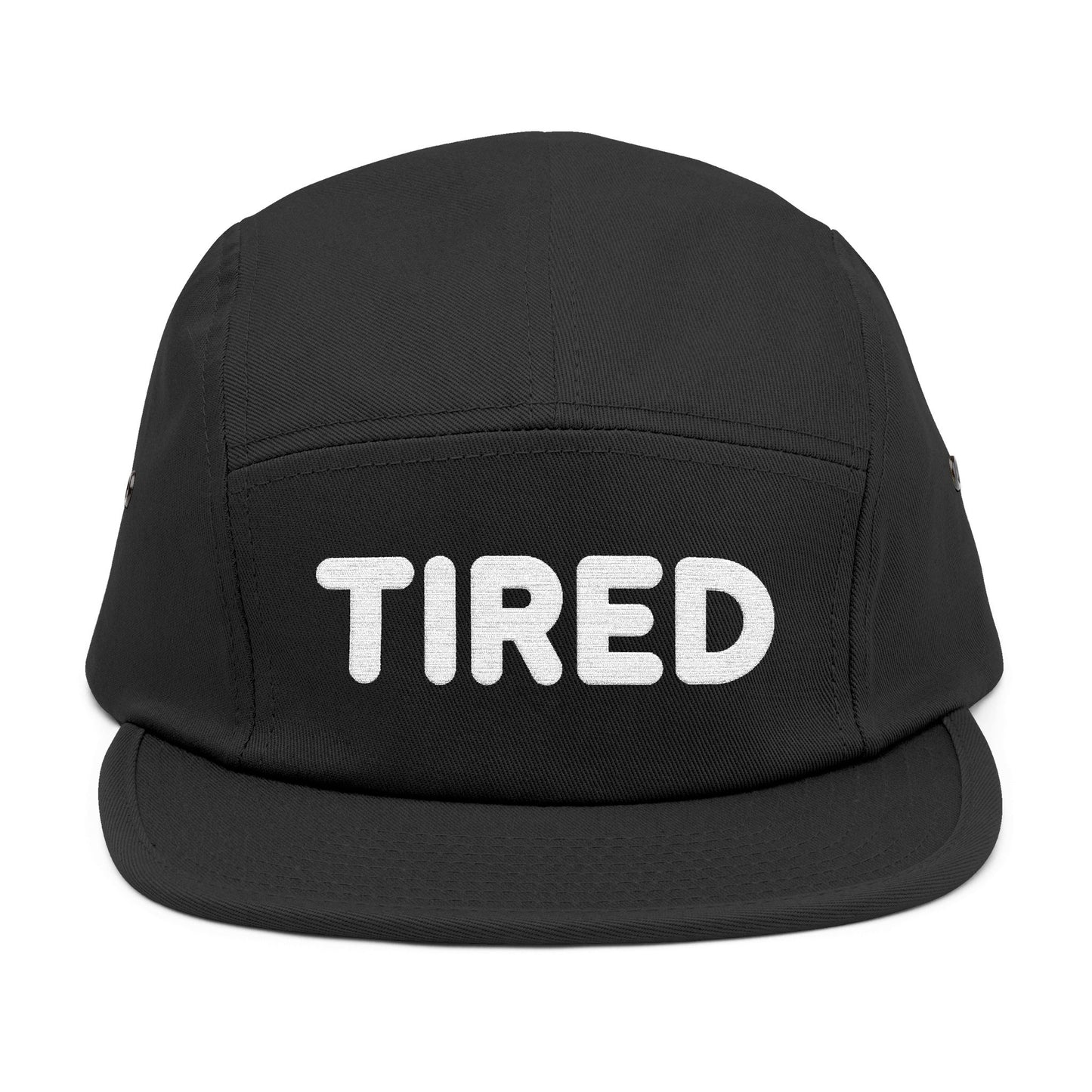 Black cap with 'TIRED' text on a white background. TIRED minimalist text embroidered on 5-panel cap by TEEZOCA