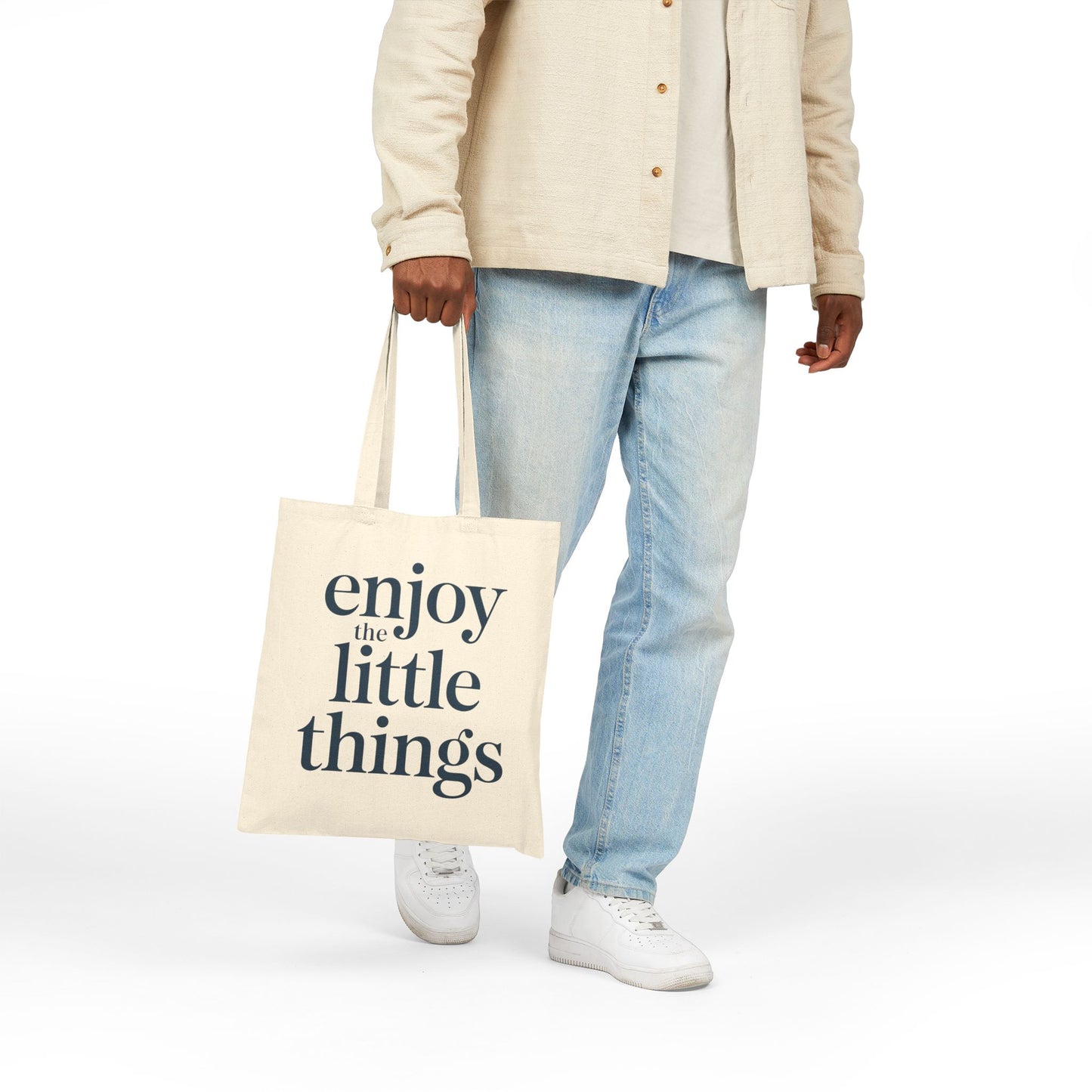 Inspirational quote design reading Enjoy the Little Things on a modern TEEZOCA tote bag
