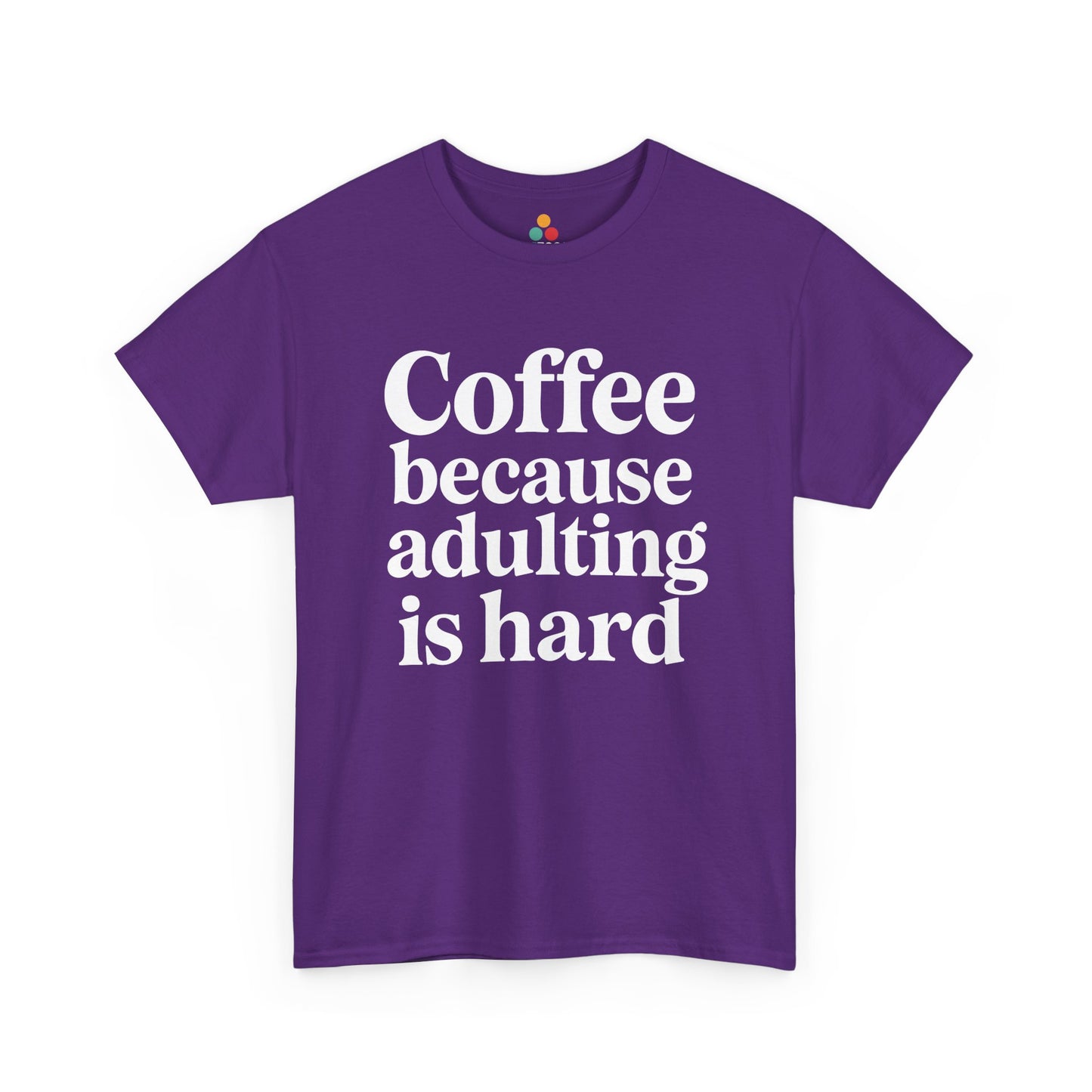 “Teezoca Coffee Because Adulting Is Hard t-shirt, bold white funny saying, purple tee, front view.”