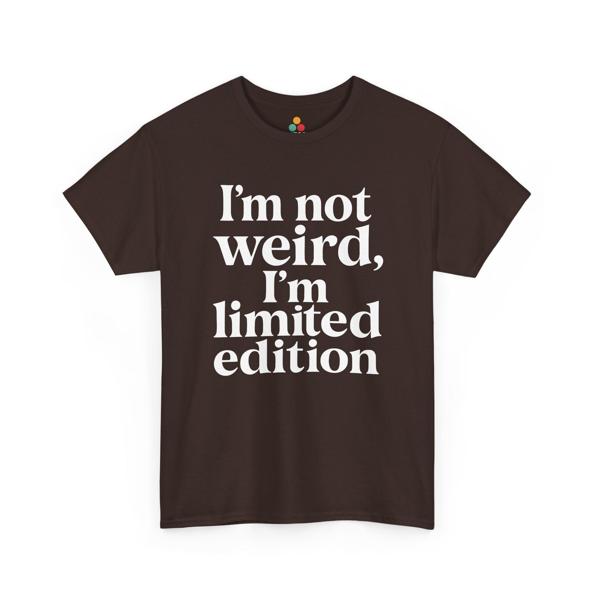 “Teezoca I’m Not Weird I’m Limited Edition t-shirt, clean white serif lettering, dark brown tee, front view.”

