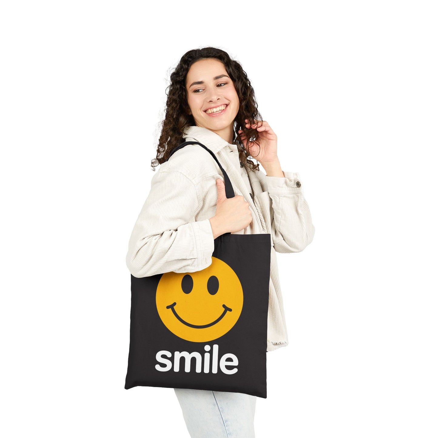 Positive smile-themed illustration with bold yellow circle on a TEEZOCA tote bag