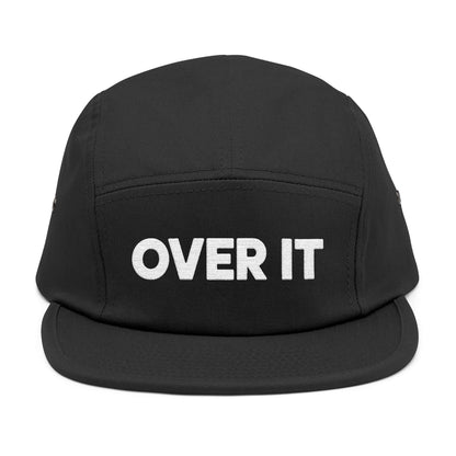 Black cap with 'OVER IT' text on a white background. OVER IT embroidered text design displayed on clean white typography. TEEZOCA