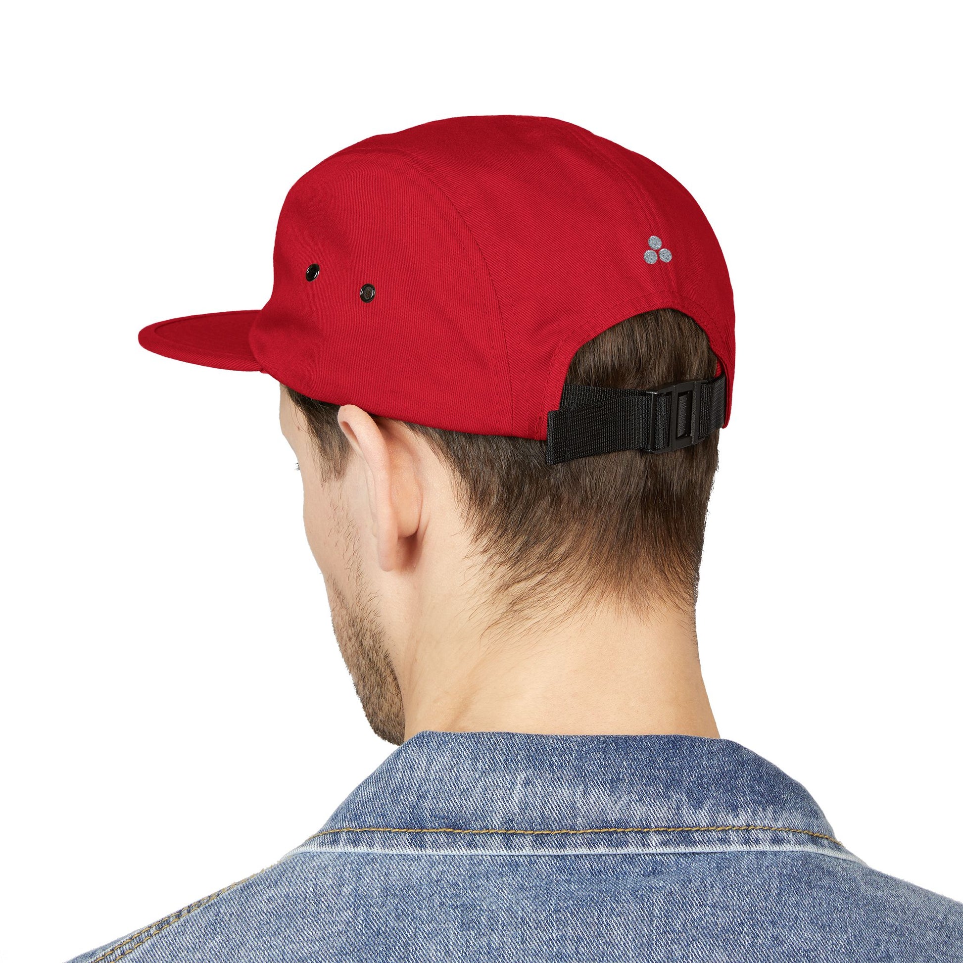Red cap worn by a person on a white background. Minimal duck silhouette embroidered on 5-panel cap by TEEZOCA