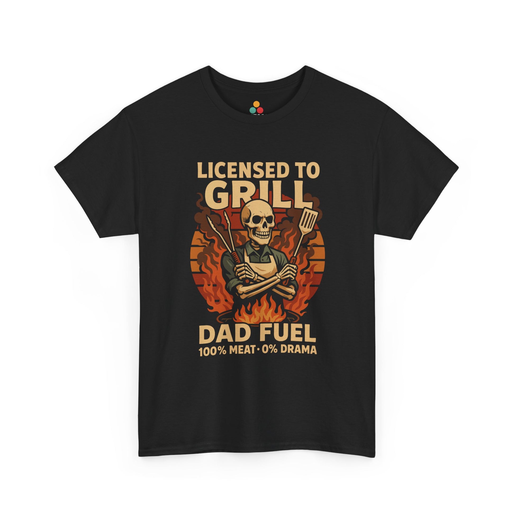 "Black t‑shirt with skeleton grillmaster holding utensils and the text 'LICENSED TO GRILL – DAD FUEL 100% MEAT 0% DRAMA,' flat front view."

