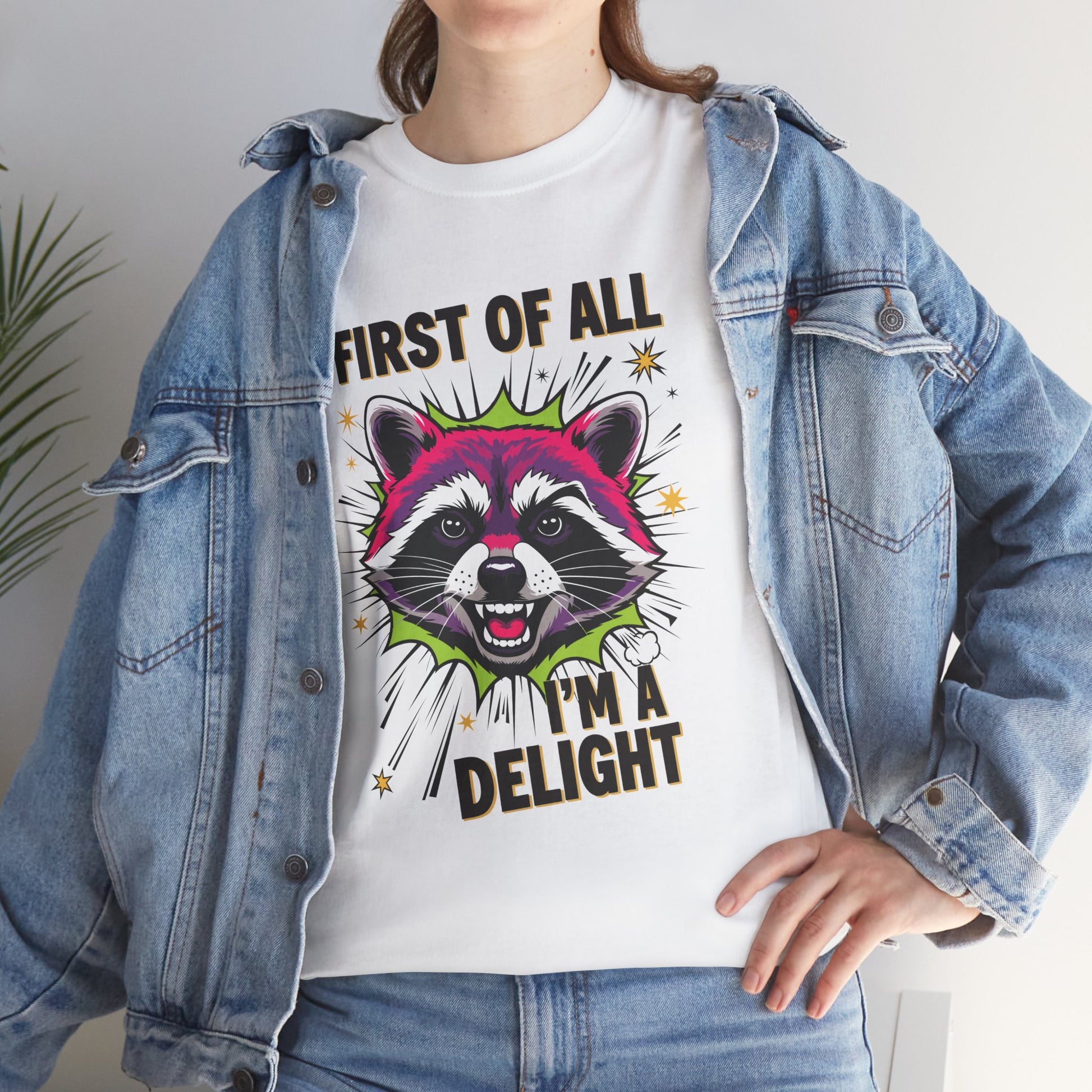Woman in a denim jacket layering a TEEZOCA “First Of All I’m A Delight” sarcastic graphic shirt.