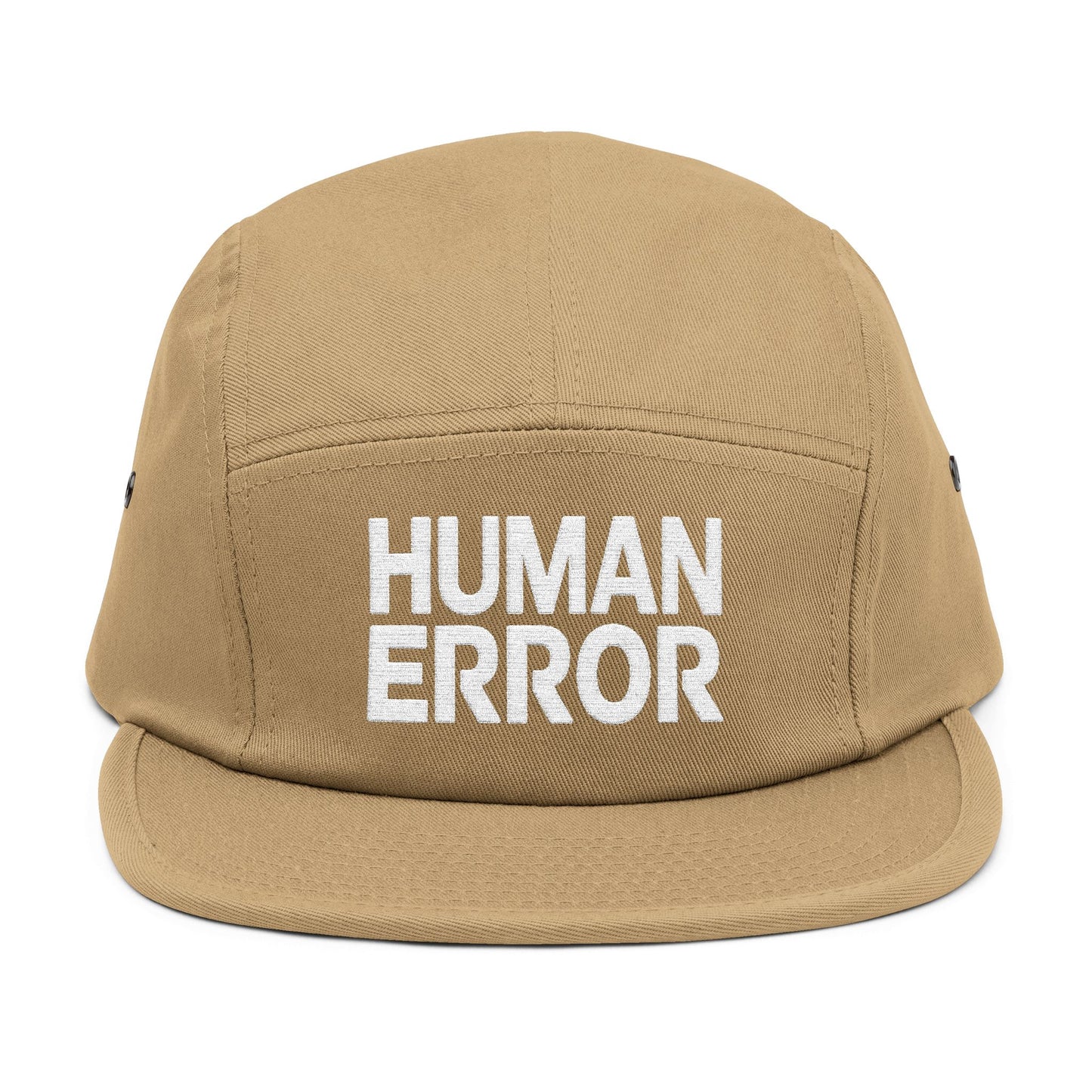 Tan cap with 'HUMAN ERROR' text on a white background. Front view of an embroidered 5-panel cap featuring the bold “HUMAN ERROR” typography in white. TEEZOCA