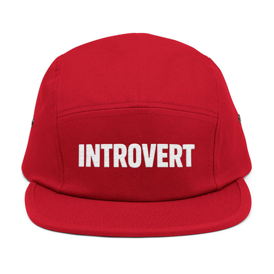 Red cap with 'INTROVERT' text on a white background. Minimalist embroidered “INTROVERT” text design in bold white lettering. TEEZOCA