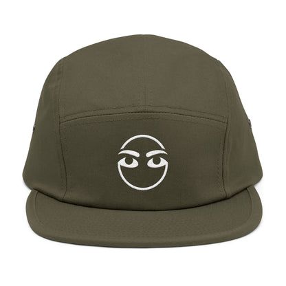 Green cap with a white face design on a white background. Raised brow face minimalist embroidery design in white. TEEZOCA