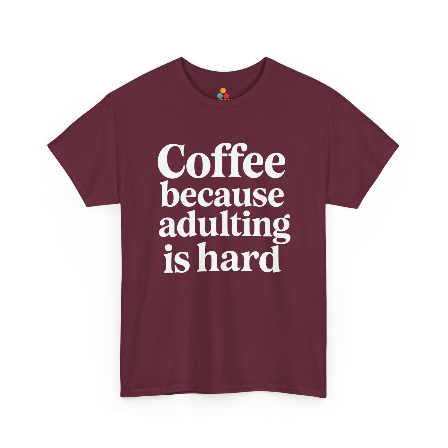 “Teezoca Coffee Because Adulting Is Hard shirt, bold white coffee quote, maroon tee, flat front display.”

