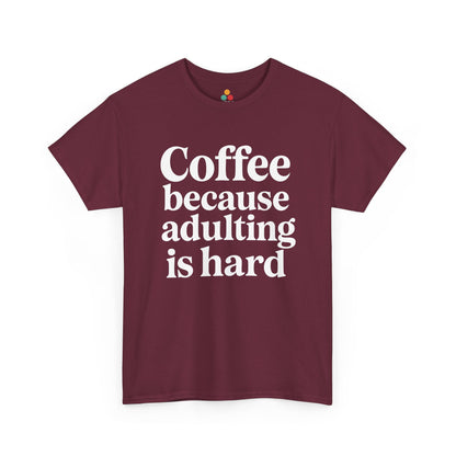 “Teezoca Coffee Because Adulting Is Hard shirt, bold white coffee quote, maroon tee, flat front display.”

