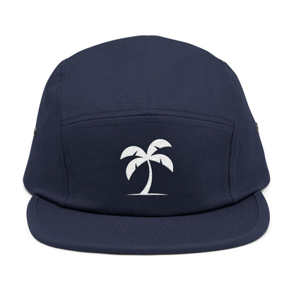 Navy blue cap with a white palm tree design on a white background. Minimal palm tree silhouette embroidery design on 5-panel cap. TEEZOCA