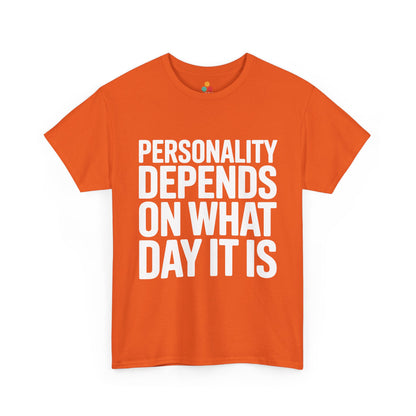 Orange t-shirt with white text 'Personality depends on what day it is' on a white background | TEEZOCA