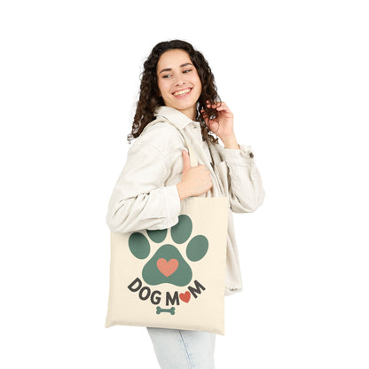 Pet lover Dog Mom design with paw and bone illustration on a TEEZOCA tote bag