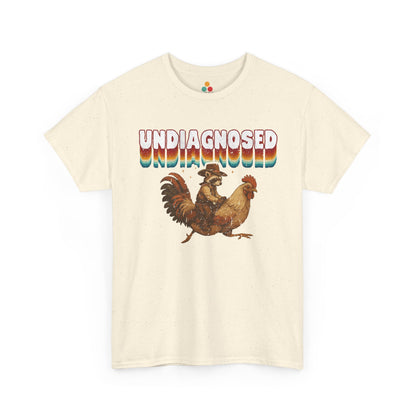 Beige t-shirt with a rooster graphic and 'undiagnosed' text on a white background