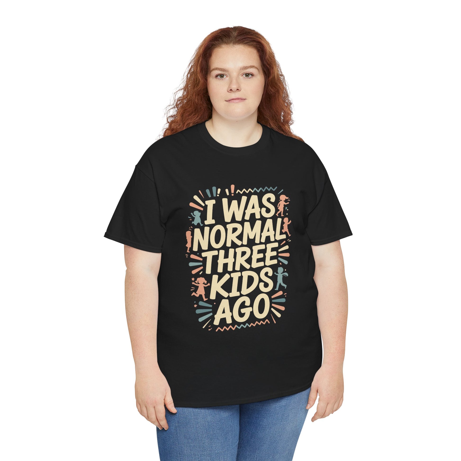 Woman wearing a black TEEZOCA “I Was Normal Three Kids Ago” sarcastic parent tee with jeans.