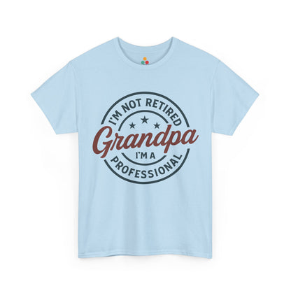 Light blue t-shirt with text 'I'm not retired Grandpa, I'm a professional' on a white background