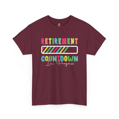 “Teezoca Retirement Countdown In Progress shirt, rainbow letters and bar, maroon tee, flat front display.”

