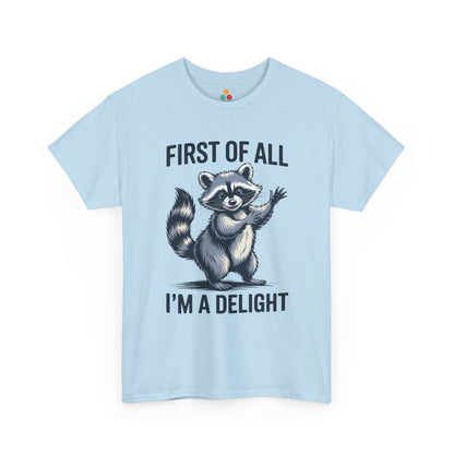 TEEZOCA light blue “First Of All I’m A Delight” novelty raccoon t‑shirt displayed flat.