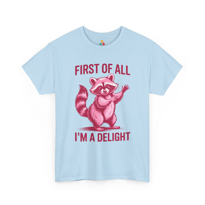 TEEZOCA light blue “First Of All I’m A Delight” novelty raccoon t‑shirt displayed flat.