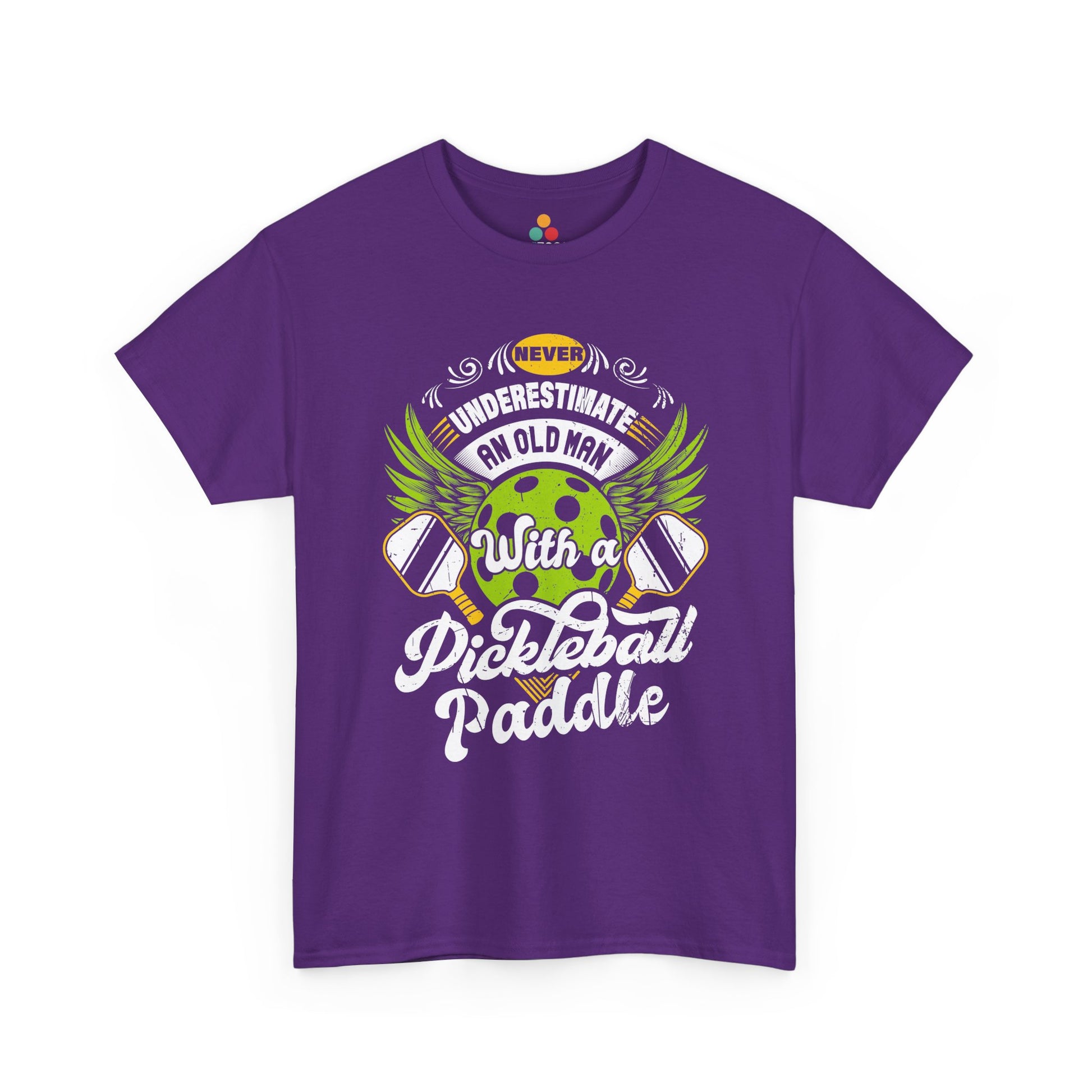 “Teezoca purple Never Underestimate an Old Man with a Pickleball Paddle shirt, bright green ball and white script graphic, novelty pickleball gift tee, front.”

