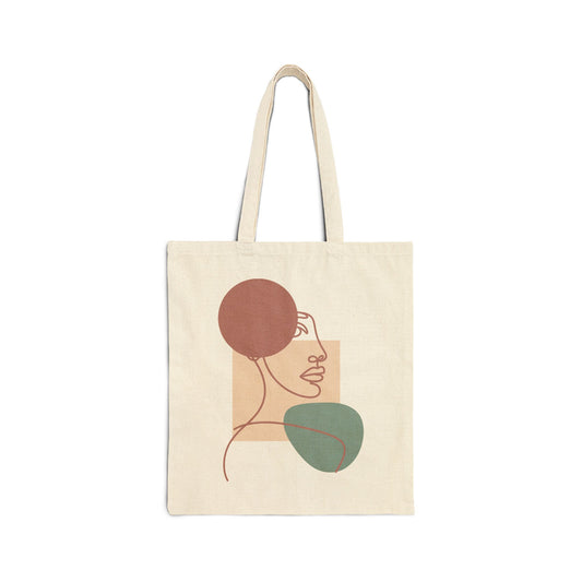 TEEZOCA tote bag with abstract line art face and geometric shapes design